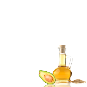Eine Ölflasche mit einem Korken, die bis zum Rand mit Öl gefüllt ist. Neben der Flasche liegen kleine Saaten und eine aufgeschnittene Avocado.