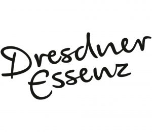 Der Schriftzug "Dresdner Essenz" in der typischen Schriftart und in schwarzer Schriftfarbe.