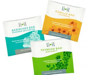 Die Li-iL Produkte Kamille Bad "Hautwohl", Basisches Bad "Rügener Heilkreide" und Thymian Bad "Winterfit" im Design von 2012 liegen nebeneinander.